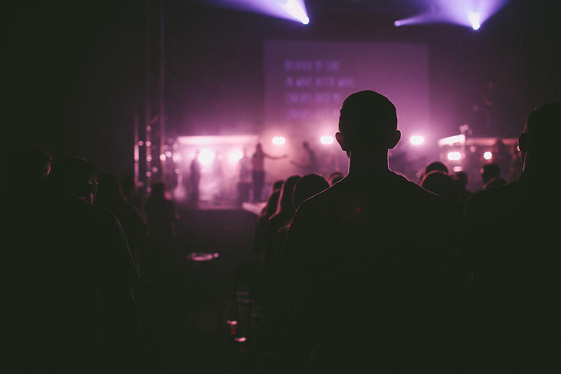 Congregation Sitting In A Church Worshiping