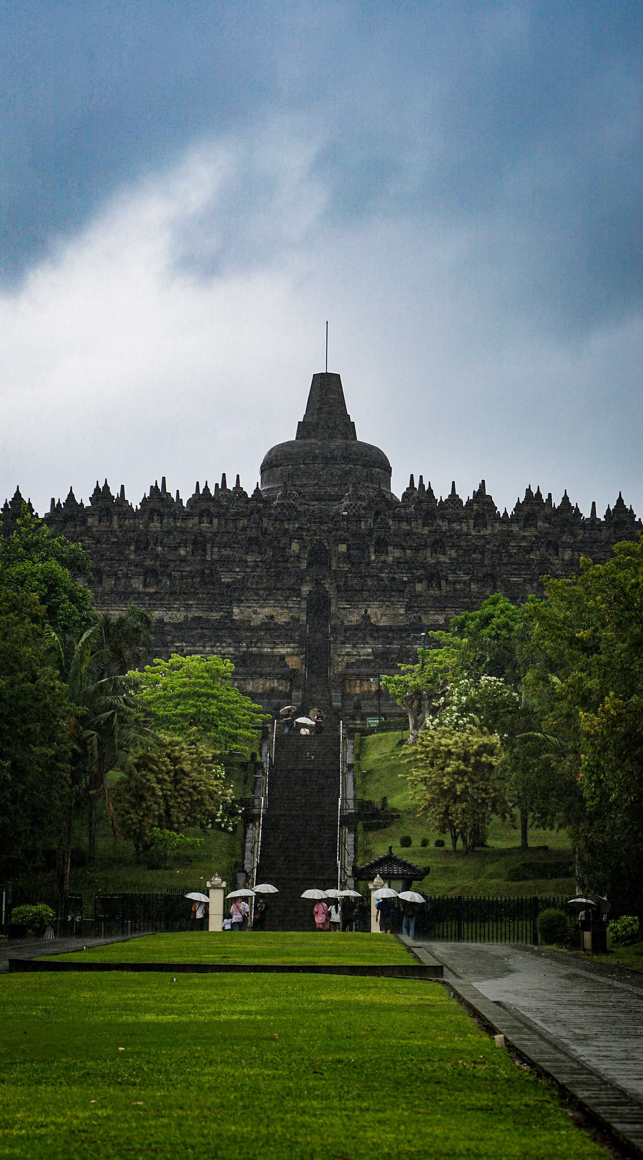 A photo looking up at Borobudur Temple.