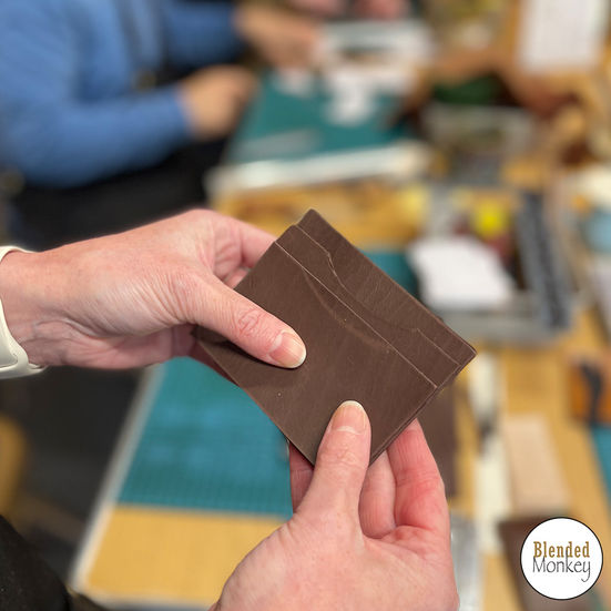 Getting the card case sections of leather ready to stitch
