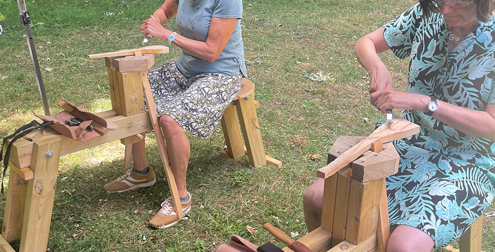 Friends enjoying their spoon carving workshop together