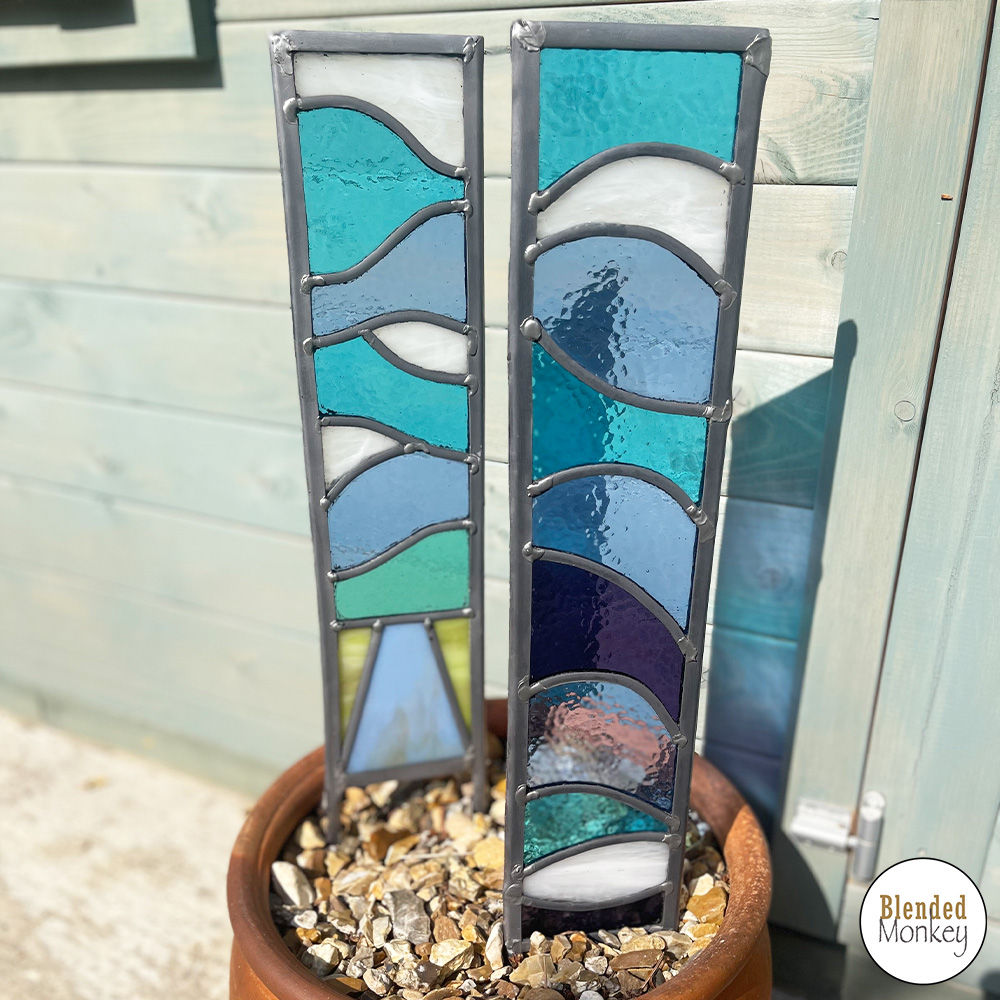 Examples of freestanding leaded glass panels that can be made in this workshop