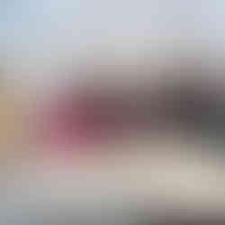 Group of students with their finished pieces of stone carving