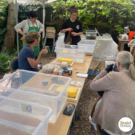 Zakiya demonstrating the paper making processes
