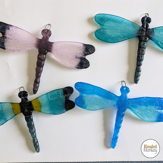 Beautiful fused glass dragonflies made at our Blended Monkey fused glass workshop