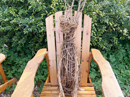 One of today's student`s willow hares enjoying a rest in the chair in the Blended Monkey gardens