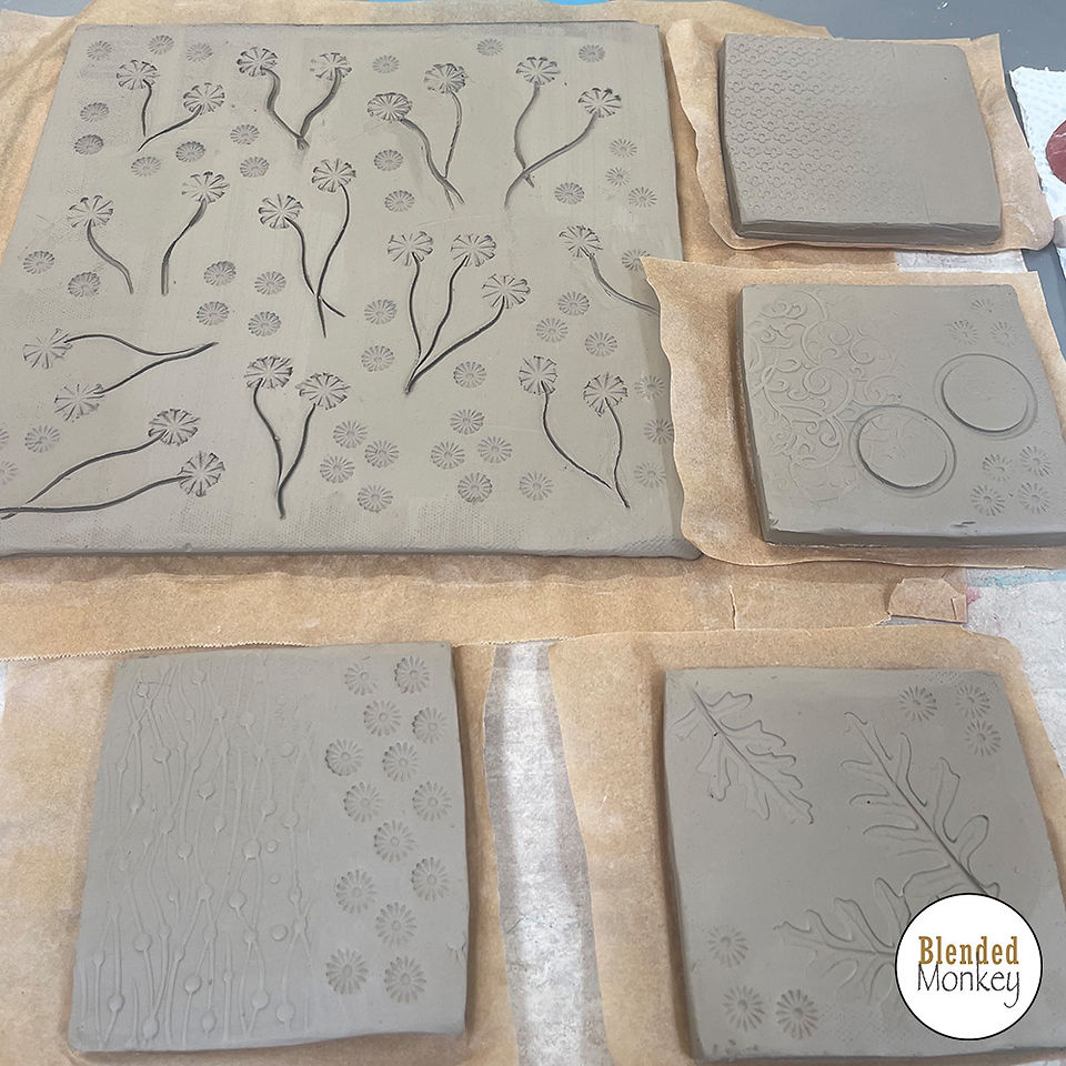 Beautiful tile & coasters designed and ready to be underglazed