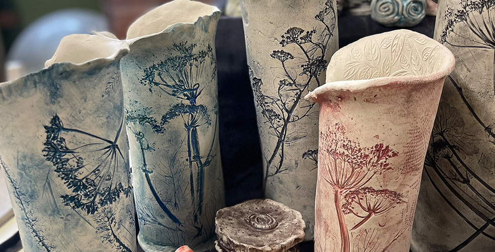 Beautiful ceramic botanical vases made by our Blended Monkey students