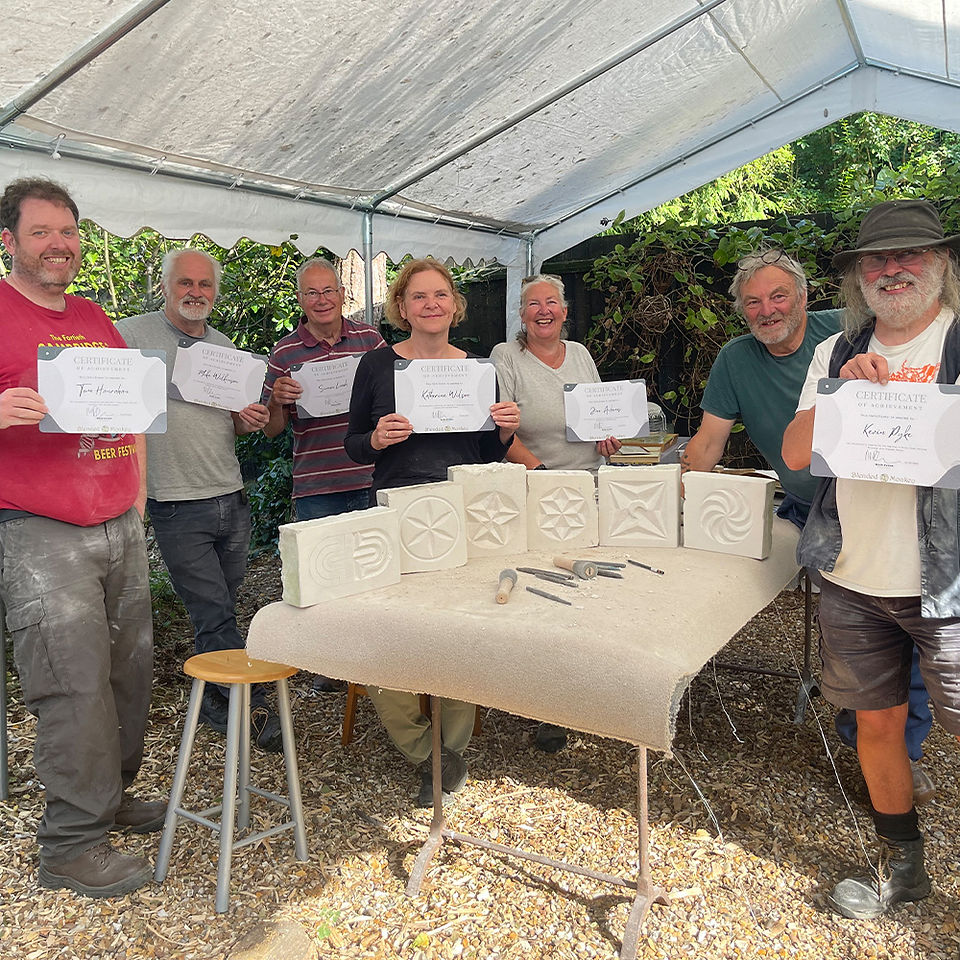 Stone carving group in our dedicated undercover outdoor space