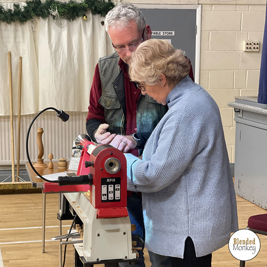 One of the Watlington WI members having a go at woodturning