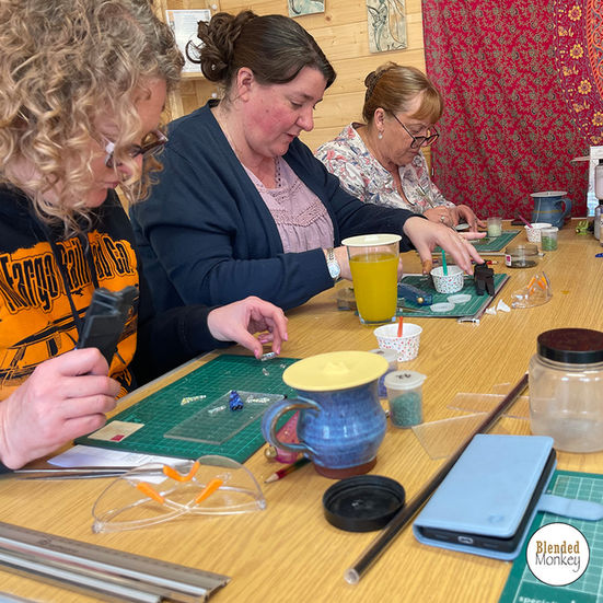 Students enjoying their Blended Monkey fused glass experience