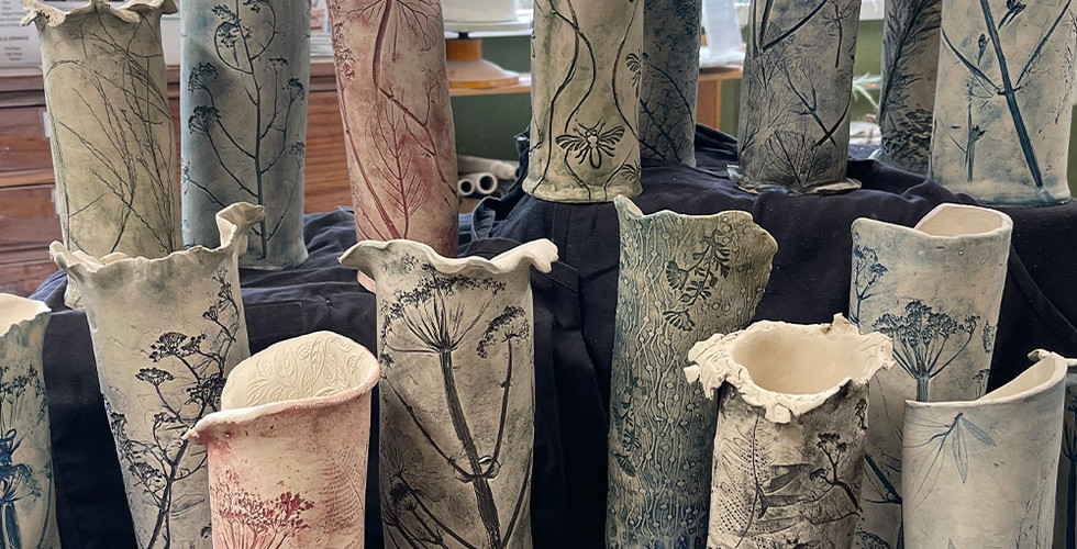Beautiful ceramic botanical vases made by our Blended Monkey students