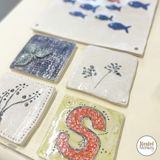 Glazed and fired coasters made by one of our Blended Monkey students