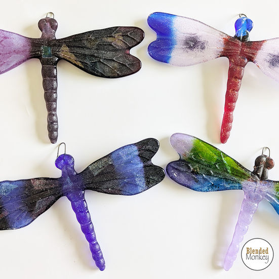 Beautiful fused glass dragonflies made at our Blended Monkey fused glass workshop