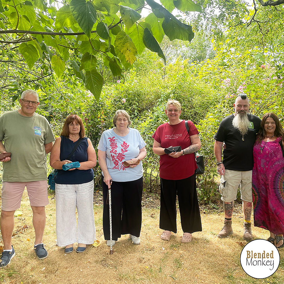 Group of leatherworkers showing off their fabulous glasses cases