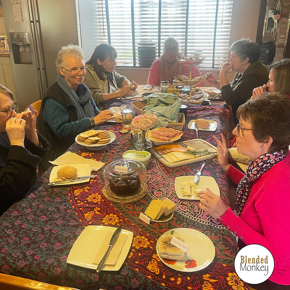 Textile art group enjoying a lovely lunch in our farmhouse-style kitchen