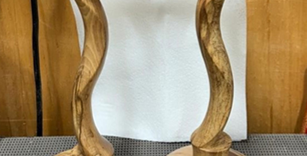Off-centred candlesticks turned on the lathe by Simon from Blended Monkey
