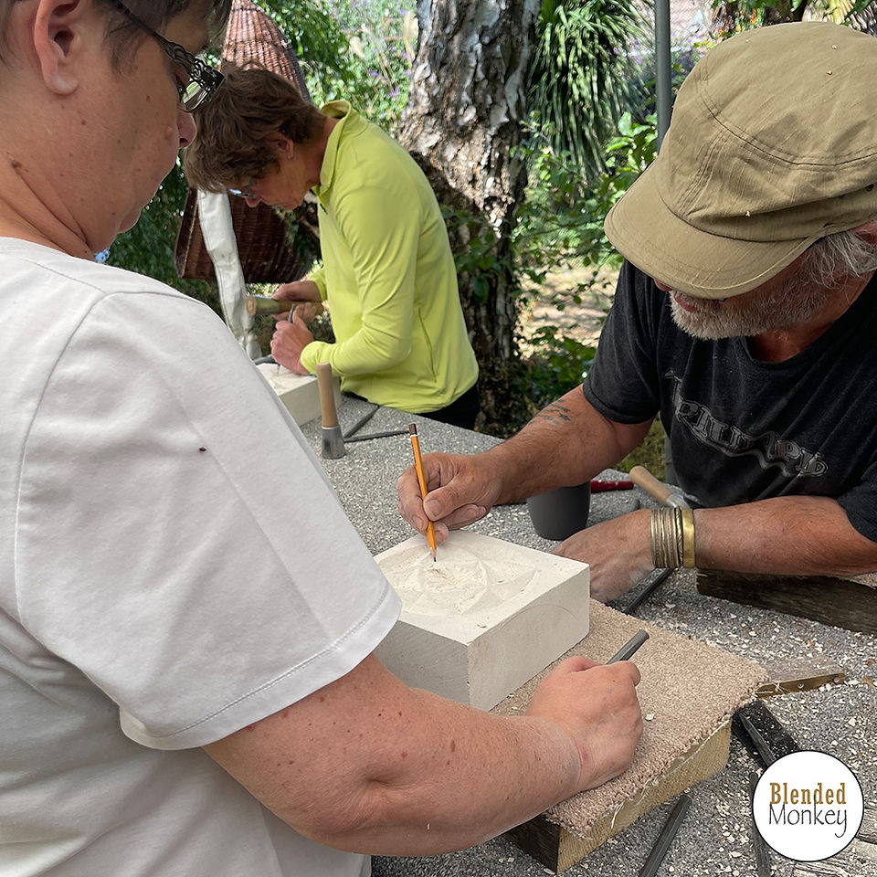 Students enjoying their stone carving workshop here in the Blended Monkey Studios & Gardens