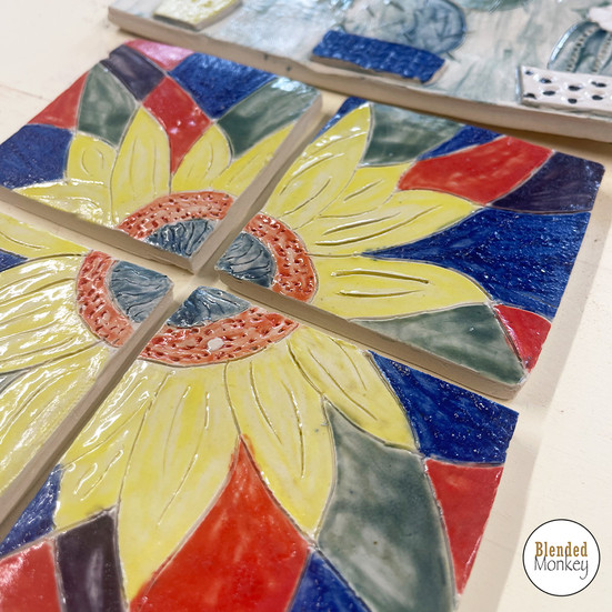 Glazed and fired coasters made by one of our Blended Monkey students