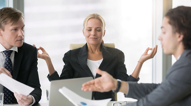 Business negotiation, male partners arguing, funny easygoing woman keeping calm in stressi