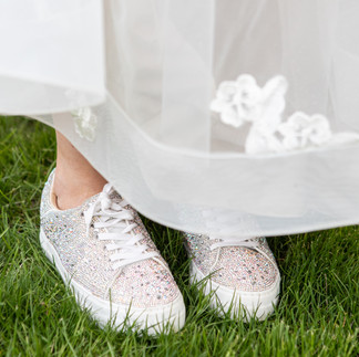 Bride wearing glam sparkly bride shoes