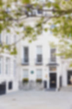 Image of outside building with tree.