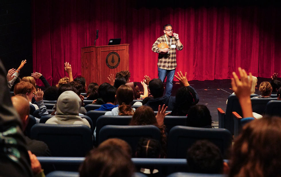 Amar speaking to a crowd in Michigan.