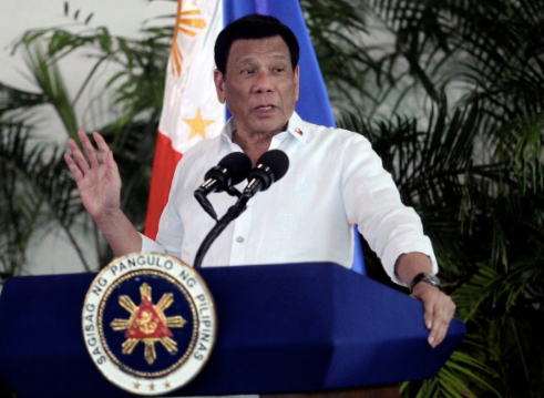 FILE PHOTO: President Rodrigo Duterte speaks at Davao International airport in Davao City in southern Philippines, September 8, 2018. REUTERS/Lean Daval Jr/File Photo