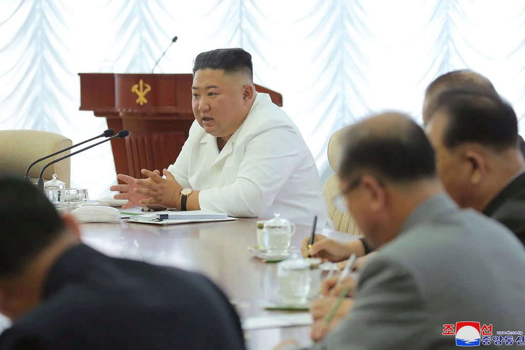 The North Korean leader, Kim Jong-un, during a Politburo meeting on Sunday.Credit...Korean Central News Agency, via Associated Press