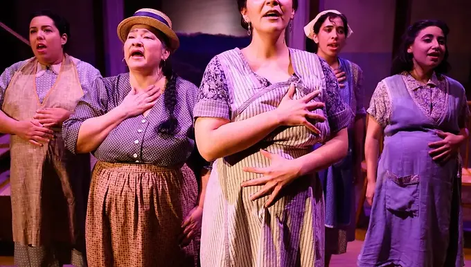 “A woman’s place is in the kitchen” may be a running joke in 2023, but in Spain in the 1930s, the statement would have been met with stern nods of approval. Spanish playwright, author, and poet Federico García Lorca demonstrates just how deep-rooted this sentiment was in Spain through his rural tragedies that offer the rare perspective of almost exclusively female characters. His 1934 play, Yerma, follows the life of a young woman, Yerma, and her desperate desire to procreate in a society that decrees this as a female’s rightful and only role in the world. Her name, literally meaning “barren” and “wasteland” in Spanish, leaves nothing to the imagination as to what the central theme is throughout the play. While Lorca leaves his characters’ roles unfulfilled, he fulfills his own self-appointed role as a writer of tragedy through the harsh realities of the thirties, when one need not look further than the life of a woman to discover tragedy. His final work, La casa de Bernarda Alba , was written in 1936, finished just before the playwright’s untimely death by execution that same year. The play observes the household of the matriarch (and oftentimes, patriarch), Bernarda Alba, and her five bitter and outspoken daughters. The women suffer isolation and are denied any autonomy under the watchful eye of their authoritarian mother, which drives them to lethal extremes when an escape route through marriage is introduced to the brooding bunch. Any work of literature is a reflection of the society in which it was written, holding a mirror up that, oftentimes, exposes ugly realities that have been masquerading as culturally acceptable norms. These two famous plays which simply paint a picture of daily life in rural communities, are categorized as tragedies not because of the corporeal deaths that take place, but because of the hypothetical deaths of the lives Lorca’s characters could have experienced if not for the uncompromising gender roles of society. The rural backdrop of 1930s Spain seems like it might be the very birthplace of the well-known proverb “It takes a village to raise a child.” After all, during this period, “woman” was synonymous with “mother.” Yerma’s tribulations extend beyond her inability to fulfill a role as a woman. It corrodes her very gender identity, going as far as to say “If only I were a woman” (Lorca, 1934), implying that because she is not a mother, she is not even a real woman. Since the occupation of Mother was such a vital title, if one found themself “unemployed,” wouldn’t they welcome any child against their barren bosom? Why would that role be limited to being a mother solely to the fruit of one’s loins? However, Spanish women’s desperation for offspring draws a firm and unwavering red line between “ my  children,” and “ other’s  children.” When Yerma’s husband, Juan, attempts to quiet his wife’s unceasing implorations for a child by suggesting one of her nephews live with them, Yerma quips with a biting “ I don’t want to look after other people’s children. I think my arms would freeze from holding them.” (Lorca, 1934). This is not the forlorn voice of a woman yearning to love a child, this is the bitter voice of a woman who is failing to fulfill a societal role which she knows will result in suffering the ire of the masses. She is painfully aware that her life will be reduced to anecdotal jabs that help the townswomen pass the time as they launder the clothes belonging to their own societal success and bask in their good fortune.  Juan’s solution of adoption is the natural remedy for a person who wishes to be a parent for the sole purpose of being a parent. However, it is clear by Yerma’s acrimony to this suggestion that she does not wish to be a parent; she wishes to abide by the rules that society dictates. The penultimate scene of the play offers Yerma an alternative route to motherhood, but one that is stained with shame and sin. An old woman offers refuge to Yerma as her potential daughter-in-law, offering up her allegedly virile son to fill her empty womb. Yerma repudiates the old woman’s offer with disgusted verve, launching into a tirade about honor and loyalty. To someone living outside of the stringent cultural regulations of 1930s Spain, this reaction may seem a little harsh. If it were truly about a child and a child alone, this seems like an unfortunate yet viable resolution. Yerma is not staying in her marriage out of love, as it was verbally established in no uncertain terms that she has no love for Juan. She stays because she has accepted her fate as a barren woman, but refuses to accept a fate of being doubly shamed as both barren and a "floozy" who has abandoned her vows of virtue and matrimony. Society has bound her to this man, and Yerma, a steadfast disciple of society to the point of cultural personification, refuses to stray (Devi & Selvalakshmi, 2018). In the crescendo of the final scene, Juan admits that he does not desire a child, and asks Yerma to relinquish these hopes. “Many women would be happy to live your life. Life is sweeter without children. I’m happy without them. It’s not your fault” (Lorca, 1934). During a time when women were blamed and shamed for barrenness, Juan’s acquittal of Yerma’s “deficiency” is frankly shocking. He proclaims that all he wants is Yerma and Yerma alone, not what she can provide for him. He is exonerating her from a backbreaking life devoted to the nonstop care of children and allowing her to dodge the danger of childbirth, a very real risk in rural areas nearly a century ago. For example, in  La casa de Bernarda Alba , La Poncia makes an alarmingly nonchalant comment that from “her experience” Angustias will die in childbirth from her first child due to her narrow hips (Lorca, 1936). Yerma's husband is offering her the chance to escape such a fate, yet society has told her that being a childless wife is a fate worse than death. Juan’s candor proves to be his demise, as it prompts Yerma to choke him to death. After which she screams “I’ve murdered my child! I’ve killed my own son!” (Lorca, 1934). Any scant hope of ever fulfilling her societal role dies with her husband; she has destroyed the only culturally acceptable route to conceive a child. “No Man is an Island,” But Every Woman May Be Yerma’s literary foil appears in the form of a nineteen-year-old married girl who is child-free. In this case, the positive adjective of “child-free,” is a more apt description than the negative form of “childless,” which can be applied to Yerma. This girl spurns the idea of motherhood and is gleeful to have escaped it thus far, despite her marital status. Lorca grants her the character title of “second girl ,” not “second woman ,” because by Yerma’s definition, her lack of offspring does not make her a woman. When the girl voices her revolutionary ideas of living life free from burden, a mystified Yerma asks why she even got married. The girl  is not at a loss for words: “Because they made me marry. They make everyone marry. If it goes on like this, there will only be little girls left. Anyway, in reality you’re married long before you go to church. But the old women fret about these things. I’m nineteen and I hate cooking and cleaning. And now I have to spend the whole day doing what I hate. What for? Why did my husband need to become my husband? We do the same now as before. It’s all old women’s foolishness… You’ll be calling me crazy too. ‘Crazy! Crazy!’ ( she laughs ) I tell you the one thing I’ve learned in life: everybody’s stuck in their houses doing what they don’t want to do. It’s so much better outside. I go to the stream; I climb up and ring the bells, I take a drink of anisette” (Lorca, 1934). These impassioned sentiments sound more like the musings of a 2023 independent single woman living alone in a New York City townhouse with her name on the mortgage than that of a 1934 married girl living in a rural Spanish village with her name on nothing, not even her own womb. This novel thinking is why she has been labeled as “crazy,” by the other townspeople with whom she has shared these beliefs. Through the eyes of society, the girl is rejecting her one and only job, and since she rebuffs the title of “mother,” her new title is “crazy.” The girl is anticipating Yerma’s scandalized rebuke, yet it does not come. She simply steamrolls over the girl’s speech, writing it off as so radical it need not even be properly admonished aside from a flippant “hush.”  Yet, one of the points in the girl’s senseless rambling resonates with Yerma. She mentioned that her mother had herbs to aid with reproduction, and Yerma inquired as to the woman’s whereabouts, a question filled with transparent ulterior motives. Even when confronted with the notion that life without children does not have to be marked by misery and failure, but instead by joy and liberation, Yerma is not deterred. Her societal acquiescence is an indelible part of her character. The juxtaposition of the girl and Yerma does not stop at their conflicting opinions on motherhood, but their perspective on society. The girl’s ideals on how a woman’s quotidian life could and should be led are so resolute that they have created an impermeable shield against the harsh maelstrom of society’s dictations. She literally laughs in the face of Spanish society’s pressure to reproduce and refutes the label of “crazy.” Her own validation is all she needs. Meanwhile, Yerma is floundering in the storm, caught out with no umbrella and no refuge in sight except the safe and dry ivory tower in the distance, reserved exclusively for the village mothers who look down on her with pity and secret schadenfreude . La casa de Bernarda Alba : Where Blood Is Not Thicker Than Water Although La casa de Bernarda Alba’ s focus is not primarily on the societal role of becoming a mother, that does not mean that the maternal opinions of Bernarda’s daughters do not seep into the crevices of conversation. While the daughters are discussing the eldest, Angustias’, impending nuptials, La Poncia comments that if she starts having children, the daughters will have to sew clothes for their nieces and nephews. This notion is met with revulsion, as Magdalena “has no intention of sewing a stitch,” and Amelia latches onto the aversion with: “Much less look after someone else’s children. Look at the neighbors down the street, martyrs to four little idiots” (Lorca, 1936). There is not an ounce of ambivalence in the women’s statements; any children of their sisters will be getting nothing from their aunts except animosity. They share the same stance on other people’s children as Yerma; it is no matter if their familial blood runs through their veins, if a child is not fully their own then they certainly will not be participating in raising any child in the proverbial “village.” Their mother declared that the mourning period for their recently deceased father will be eight interminable years where not even a breeze will enter the house. Despite this ennui , Magdalena refuses to help lighten the burden of a hypothetical new mother who is not a stranger but her own sister. Amelia refers to the parents of the four children down the street as “martyrs,” a title that requires the invoked person to be dead. Thus, Amelia is equating motherhood to death. Calling the children themselves “idiots” demonstrates a reproach of motherhood that goes far deeper than other people’s children. It seems that Amelia is questioning the very fabric of the female role as a mother. The brazen outspokenness on delicate topics that the sisters constantly partake in is ironic, as one of Bernarda’s reasons behind the abject isolation she subjects her daughters to is presumably to shield them from the outside world and its ways of warping pure and innocent girls. In the world that these women live in, a female’s greatest and only strength is her innocence and pristine reputation. However, through direct attacks on society such as the aforementioned viewpoint, it appears that the opposite has occurred. The isolation that can rival a “convent,” as La Poncia called the household, has given the women ample time to construct their own ideas and perspectives on socially-accepted roles. The sisters, especially young Adela, view their internment at La cárcel de Bernarda Alba  as punishment, yet it has fostered a rare environment where one can freely express one’s opinions, a foreign concept for women in the 1930s. In fact, the play was written in 1936 but was banned in Spain until 1963 “partly because the behavior and language of the characters was regarded as shockingly immoral” (Orwin, 2017). There is a natural conflict between mothers and daughters that does not exist between mothers and sons, and this phenomenon is only amplified when the mother-daughter ratio is 1:5. Psychoanalytical theories shed light onto the tense and complex relationship between Bernarda and her daughters. According to American sociologist Nancy Chodorow, “conflict arises because mothers ‘are the same gender as their daughters and have been girls, mothers of daughters tend not to experience these infant daughters as separate from them in the same way as do mothers of infant sons’”(Gabriele, 1993). Despite the fact that the women’s mother-mandated quarantine from the outside world has embittered them, Bernarda’s refusal to marry off her daughters is not out of spite. Based on Chodorow’s assertion, Bernarda sees herself and her five daughters as one entity. She has already lived through each one of the ages her daughters are at, and has the advantage of knowledge and experience drawn from retrospect that they lack. She makes her opinion on marriage known when La Poncia gently criticizes her for her daughters’ lack of suitors. “To sell them off!” Bernarda erupts with anger at the suggestion of marriage (Lorca, 1936). This singular statement is all that is needed to ascertain Bernarda’s stance on marriage. The usage of the verb “sell” does not require further elaboration. Marriage is to women what cattle auctions are to livestock. When Bernarda’s first husband died, who is thirty-nine-year-old Angustias’ father, there was the same mandatory eight-year mourning period that the women are observing in the play for Bernarda’s second husband. Eight years of mourning plus the human gestation period of nine months equals almost exactly nine years, which is the age gap between Angustias and her half-sister Magdalena. Taking this into consideration, Bernarda was married off to her second husband less than three months after the end of the mourning period of her first. During this second marriage, she gave birth to four daughters in the span of ten years. Since she views her daughters as extensions of herself, by denying her daughters’ marriages she is reflecting upon her own girlhood and what she would have wanted; a private and peaceful life with her family, hidden from the prying eyes of society and its expectations. The Female Experience Meets the Lorquian Experience It is easy to invalidate a man’s literary commentary on the female experience. Written by someone who has not experienced something firsthand, any account of the actions and emotions of an event is bound to be exaggerated and overdramatized, or contrived and minimized. The tried and true advice to “write what you know,” is credible for a reason. What does a man know about what it is to be a woman? However, Lorca abided by this rule to a far higher degree than superficially thought. He grew up in Fuente Vaqueros, a small village in Granada. Like Yerma and La casa de Bernarda Alba , many of his dramas were “rural tragedies” which took place in the countryside of which he was familiar, with characters laboring under the strict traditional institutions he grew up witnessing (Montes, 2023). Despite Lorca’s realistic penning of rural communities where the female is the  ama de casa  while the male works the fields, he himself did not perpetuate the cultural roles of his hometown. Unlike the farmers in his stories, Lorca was not resigned to toil in the fields to make a living due to his family’s wealth, which acted as a soft cushion between him and labor that “permitted him to live an absolutely free life, dedicated solely to the imaginings of fantasy or poetry” (Salinas, 1972). A man absolved of fulfilling a cultural role, Lorca moved to Madrid at twenty-one. It was a city geographically close to Granada but might as well be another world away. The metropolis fostered the creativity he demonstrated from a young age and he quickly “conquered” Madrid, in the words of his good friend and fellow Spanish poet Pedro Salinas (Salinas, 1972). In 1972, Salinas spoke warmly of his deceased friend in a speech prefacing the reading of a compilation of Lorca’s poems at Johns Hopkins University: “Nothing or no one could resist that vivacity, that laugh and the charm that emanated from [Lorca’s] presence and his conversation. You know that we Spaniards are very sensitive to the exterior expression of a person. We don’t esteem a person solely for what he does and what he is worth, but above all for what he is and how he is, for his charm, his sympathy and friendly feeling, and for his originality” (Salinas, 1972). Unfortunately, Salinas was erroneous in declaring that Spaniards esteem an individual based on “how he is.” A suspected homosexual, Lorca faced prejudice and bigotry from the deeply homophobic Spanish society of the early twentieth century. Some found his writing “intensely homoerotic,” which led to the ban on many of his works in 1954 and censorship on some until the end of Franco’s dictatorship –an extremely far-right institution– in 1975 (Montes, 2023). In this way, Lorca shared a bond with the plight of women that elucidated his fascination with depicting their role in his literature; they were both members of a marginalized community. Feminist protests had been slowly but steadily increasing in Madrid since the 1890s, with an encouraging boost from women joining the workforce in World War One (Johnson, 2008). Lorca’s decision to represent female roles, both traditional and radical, stems from a personal vendetta against a fight he could not win in his lifetime. Conclusion To the naked eye, Federico García Lorca was attempting to step into the shoes of women in 1930s rural Spain. Normally, this would be cited as an enormous overstep, especially judging from his lofty position in a financially-stable ivory tower not dissimilar to that of Yerma’s village mothers. However, the events of Lorca's life provided the experience necessary to justify his actions and give a voice to the whisper that was women’s daily struggles. Yerma and La casa de Bernarda Alba ’s continual appearance on stage proves that while Lorca’s life was cut short, his work’s messages live on as renditions of history textbooks far more engaging than any dry account ever could. Bibliographical References Devi, R. R., & Selvalakshmi, A. (2018). Yerma as a Vi ctim of Social Mores and Code of Honour in Lorca’s Yerma. Language in India , 18 (5). URL: http://www.languageinindia.com/may2018/renukadevicodeofhonoryerma.pdf  Gabriele, J. P. (1993). Of Mothers and Freedom: Adela's Struggle for Selfhood in La Casa de Bernarda Alba. In Symposium: A Quarterly Journal in Modern Literatures,  47(3), 188–199. URL: https://www.tandfonline.com/doi/abs/10.1080/00397709.1993.10113464?journalCode=vsym20  García Lorca, Federico. (1936). The House of Bernarda Alba (La casa de Bernarda Alba) A drama of women in the villages of Spain . A. S. Kline (2007). PDF: https://teenvalues.eu/wp-content/uploads/2020/06/La-casa-de-Bernarda-Alba.pdf  García Lorca, Federico. (1934). Yerma. A. S. Kline (2007) . PDF: http://uploads.worldlibrary.net/uploads/pdf/20121106214533yermapdf_pdf.pdf  Johnson, R. (2008). Federico García Lorca’s Theater and Spanish Feminism. Anales de La Literatura Española Contemporánea , 33 (2), 251–281. URL: http://www.jstor.org/stable/27742554  Montes, L. (2023). The Life and Legacy of Federico García Lorca . Detroit Opera. URL: https://detroitopera.org/the-life-and-legacy-of-federico-garcia-lorca/  Orwin, K. (2017). La casa de Bernarda Alba . The King’s School, Canterbury. URL: https://www.kings-school.co.uk/news/la-casa-de-bernarda-alba/ Salinas, P. (1972). Federico García Lorca. MLN , 87 (2), 169–177. DOI: https://doi.org/10.2307/2907729 Visual References Cover Image: Shotgun Players. (2023). Photo of play "Yerma." Retrieved from: https://patch.com/california/berkeley/shotgun-players-stage-adaptation-federico-garcia-lorcas-yerma  Figure 1: Palitzsch, M. (1978 ). "Lorca Yerma" Poster of the Stadttheater Würzburg. Retrieved from: http://www.reprosoc.com/blog/2016/12/2/yerma-and-the-tyranny-of-choice  Figure 2: Vernazza, E. (1977). Painting of "Yerma", Theatre Solis Catalogue. Retrieved from: http://eduardovernazza.blogspot.com/2015/07/catalogo-e-v-federico-garcia-lorca-yerma.html  Figure 3: Iberfoto / Bridgeman Images. (1960). "Les comediens Aurora Bautista et E. Diosdado dans une scene de la pièce 'Yerma' du poète et dramaturge espagnol Federico García Lorca". Teatro Eslava, Madrid.  Retrieved from: https://www.bridgemanimages.com/en/noartistknown/les-comediens-aurora-bautista-et-e-diosdado-dans-une-scene-de-la-piece-yerma-du-poete-et-dramaturge/painting/asset/5358963  Figure 4: Arrieta, N. (2016). "Vacía pero en flor" ("Empty but in Bloom") [Illustration]. Retrieved from: https://web.facebook.com/naiaraarrietailustracion/photos/vacía-pero-en-flor-así/1137788269610723/?_rdc=1&_rdr  Figure 5: Mancini, P. (2016). "La Casa de Bernarda Alba" Poster. Retrieved from: https://www.timbre4.com/teatro/168-la-casa-de-bernarda-alba-version-libre.html  Figure 6: Carazo, C. (1990). "Casa #3" from the Bernarda Alba Series [Ink drawing]. Retrieved from: http://www.artecostarica.cr/artistas/carazo-claudio/casa-3-serie-de-bernarda-alba     Figure 7: Ros, I. (2021). Illustration from the book "Federico". Retrieved from: https://www.huffingtonpost.es/entry/biografia-ilustrada-federico-garcia-lorca_es_60f93a36e4b07c153fbc8f9d.html  Figure 8: Stainton, L. A. (1919). Federico García Lorca's headshot. Encyclopedia Britannica. Retrieved from: https://www.britannica.com/biography/Federico-Garcia-Lorca