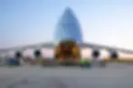 A large Cargo Aircraft, loading cargo