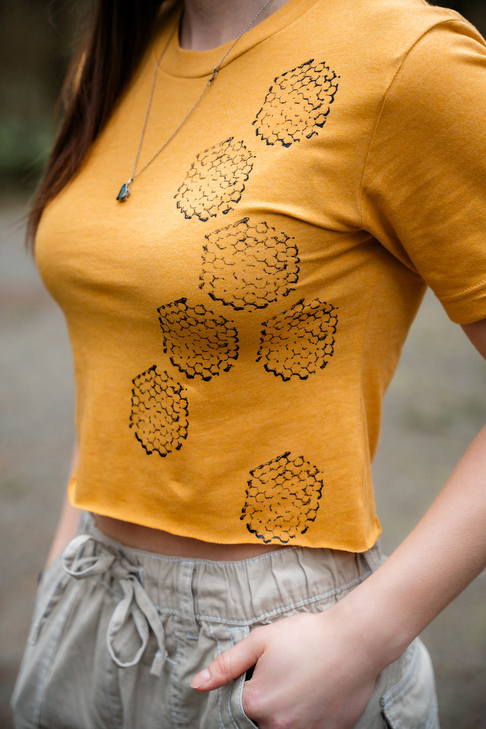 Thumbnail: bee hive stamped onto a yellow crop