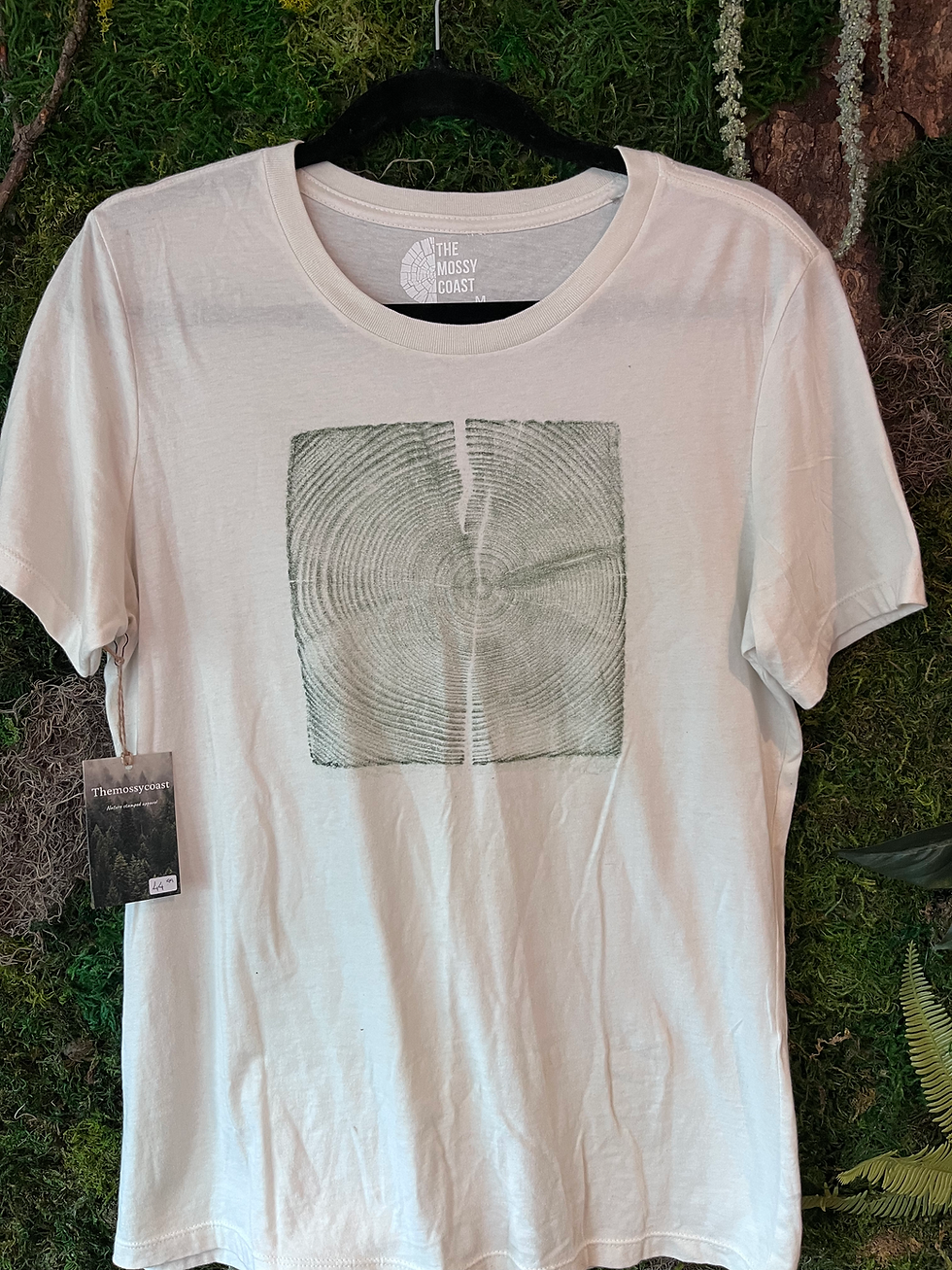Thumbnail: The Mossy Coast Timber Women’s Tee — hand-stamped with real lumber grain, relaxed fit, eco-friendly and plastic-free.