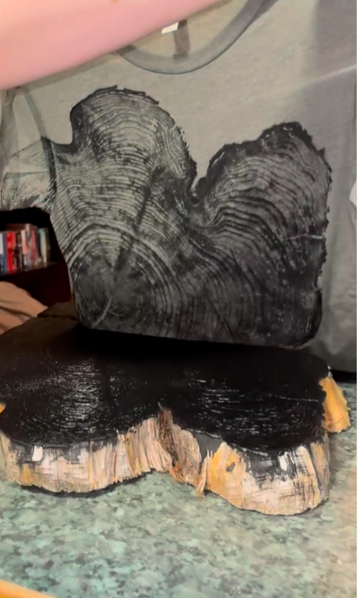 Thumbnail: the Pacific Cedar log being used to stamp our classic tee