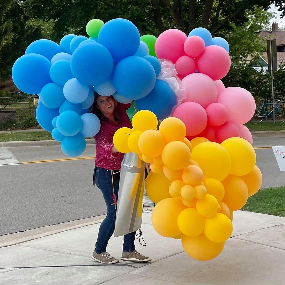 Tami carrying balloons.jpg