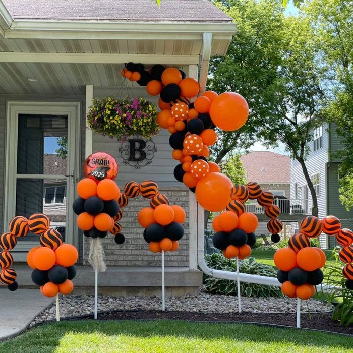 Grad balloons orange and black by Funny Faces WI