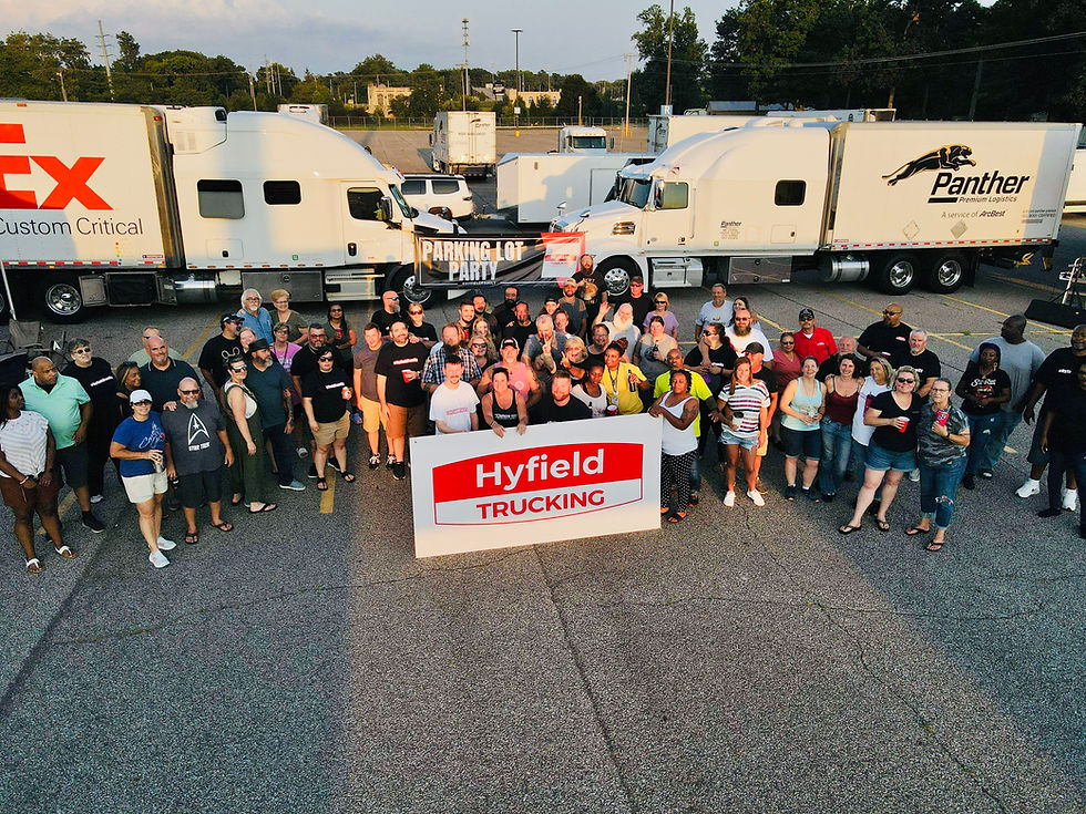 Hyfield Trucking contractors and staff together for a parking lot party