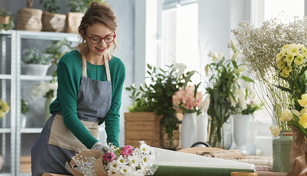 Smiling florist working.jpeg