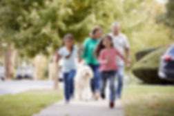 family-on-sidewalk.jpeg