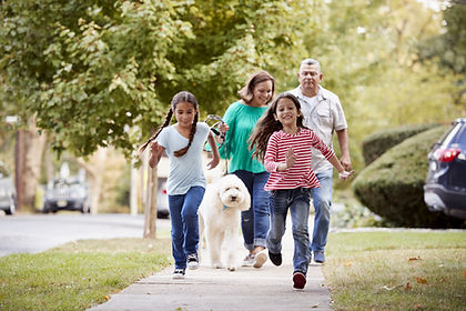 family-on-sidewalk.jpeg