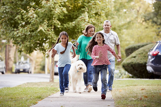family-on-sidewalk.jpeg