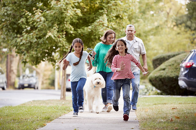 family-on-sidewalk.jpeg
