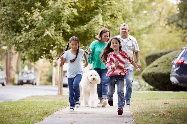 family-on-sidewalk.jpeg