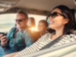 happy_family_in_car.jpeg
