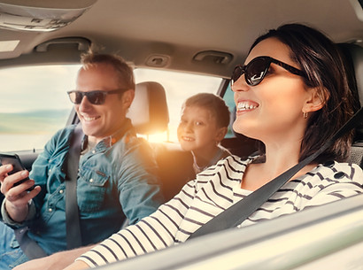 happy_family_in_car.jpeg