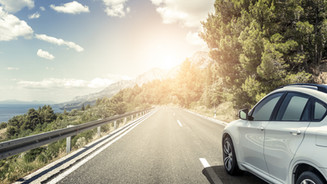 white_car_highway.jpeg