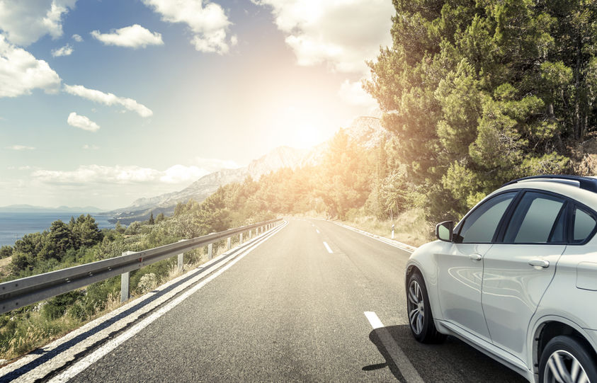 white_car_highway.jpeg