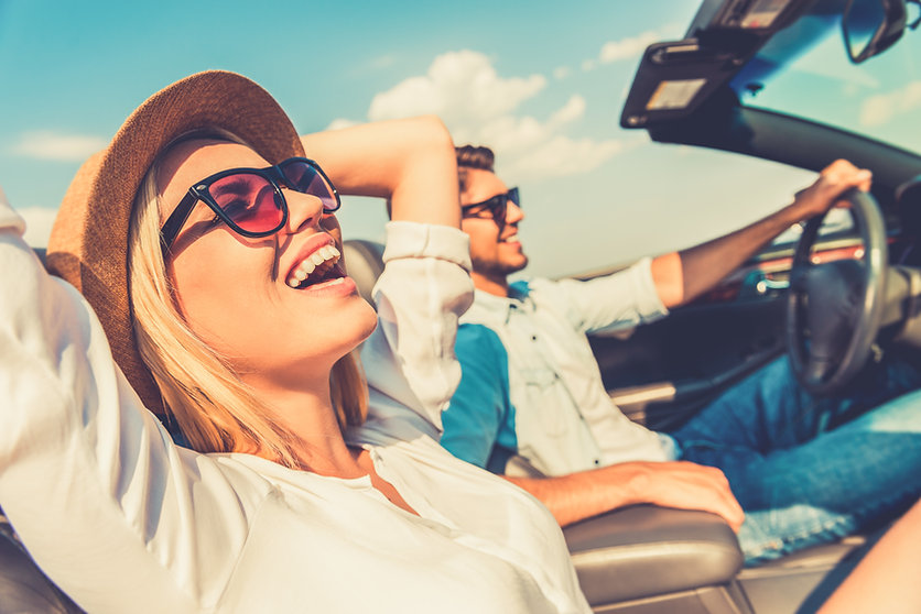 couple happy in car
