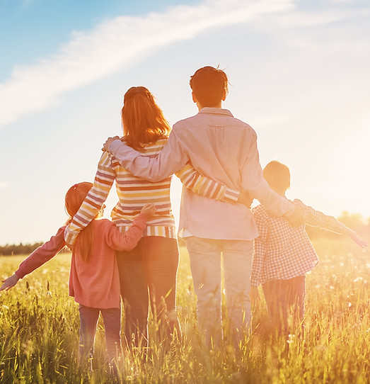 Happy family in the nature together on the evening sunset.jpeg