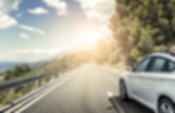 white_car_highway.jpeg