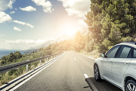 white_car_highway.jpeg